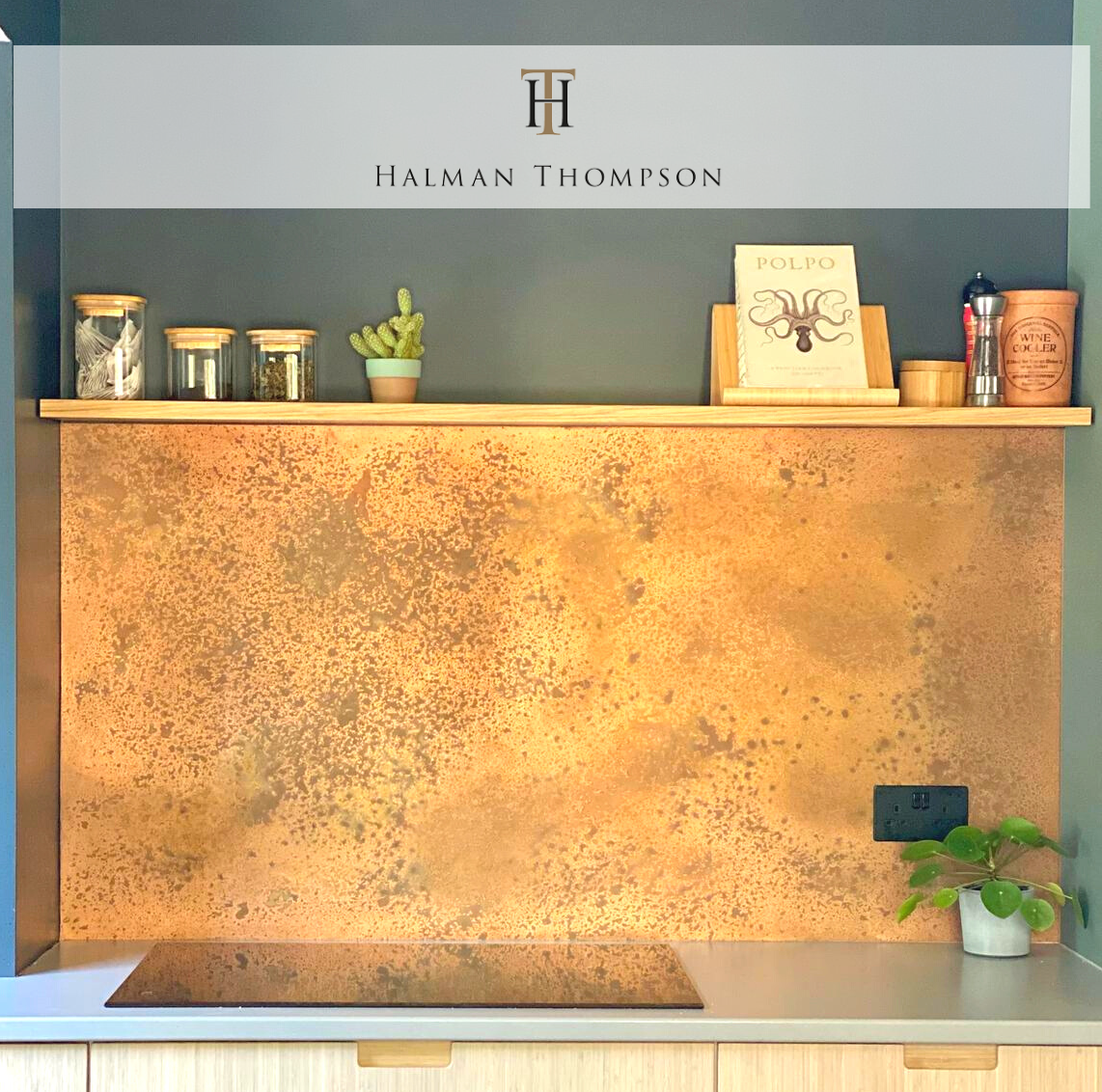 burnished copper backsplash in kitchen by Halman Thompson